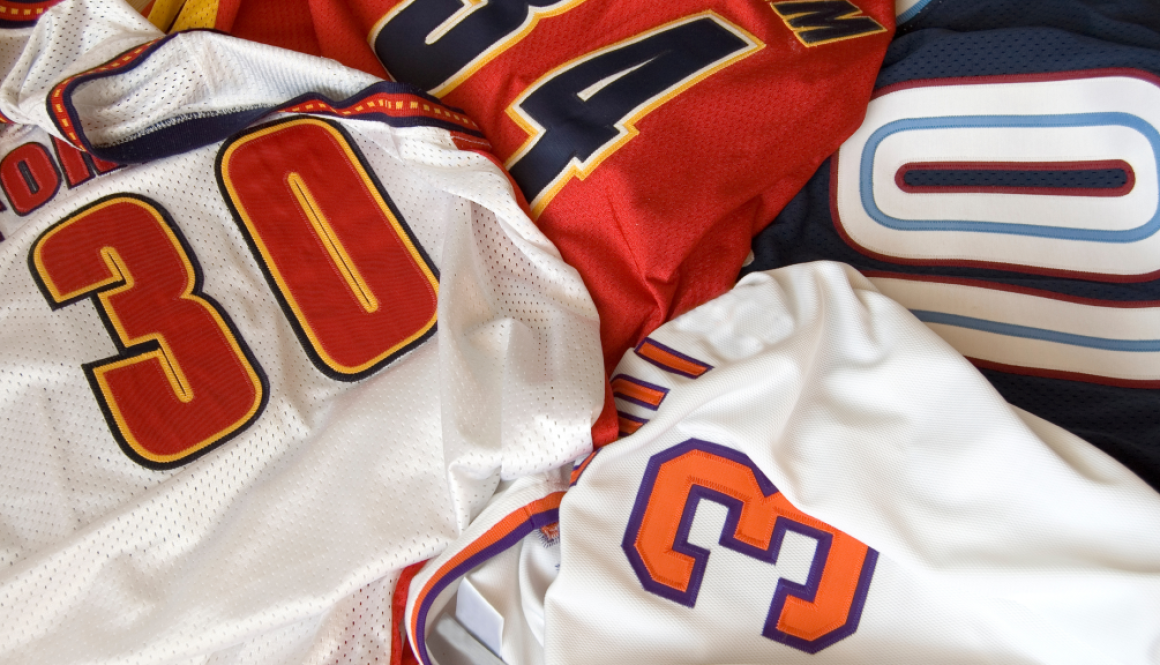 From Locker Room to Pro Shop_ The Evolution of Sports Merchandise - New Buffalo Shirt Factory Blog Featured IMG